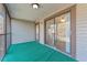 A covered porch provides outdoor views and access to the house at 12155 Environmental Dr # 8, New Port Richey, FL 34654