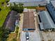 Aerial view of a single-Gathering home featuring a large backyard and front parking at 124 Athens St, Tarpon Springs, FL 34689