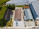 Aerial view of a single-Gathering home featuring a large backyard and front parking at 124 Athens St, Tarpon Springs, FL 34689