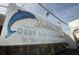 Deep Sea Fishing sign with a dolphin and gift shop advertisement at 124 Athens St, Tarpon Springs, FL 34689