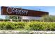 Starkey Ranch sign amid landscaping for a beautiful community entrance at 12420 Rangeland Blvd, Odessa, FL 33556