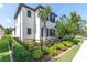 Well-maintained two-story home with blue shutters and manicured landscaping at 12420 Rangeland Blvd, Odessa, FL 33556