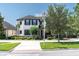 Attractive two-story home with blue shutters and landscaped front yard at 12420 Rangeland Blvd, Odessa, FL 33556
