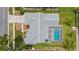 Aerial view of home with pool and backyard, showcasing the home's layout and outdoor features at 1245 Overland Dr, Spring Hill, FL 34608