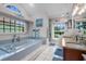 Elegant bathroom featuring a large soaking tub, updated fixtures, and a vanity with dual sinks at 1245 Overland Dr, Spring Hill, FL 34608