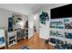 Comfortable bedroom with hardwood floors and built in shelves for toy storage at 1245 Overland Dr, Spring Hill, FL 34608