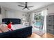 Cozy bedroom featuring a view of the pool through sliding glass doors at 1245 Overland Dr, Spring Hill, FL 34608