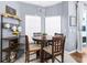 Cozy breakfast nook with a view of the backyard through the sliding glass door at 13372 Dewey Ct, Spring Hill, FL 34609