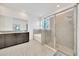Main bathroom featuring a large vanity, glass shower, and a soaking tub at 13454 Golden Lime Ave, Spring Hill, FL 34609