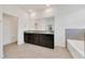 Spacious main bathroom with double vanity, soaking tub, and neutral tile flooring at 13454 Golden Lime Ave, Spring Hill, FL 34609
