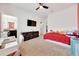 Charming bedroom with carpet floors, ceiling fan, and en-suite bathroom for added convenience at 13454 Golden Lime Ave, Spring Hill, FL 34609