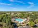 Aerial view of the community pool with plenty of lounge seating at 13454 Golden Lime Ave, Spring Hill, FL 34609