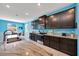 Stylish kitchen featuring stainless steel appliances, granite countertops, and a breakfast bar with seating at 13454 Golden Lime Ave, Spring Hill, FL 34609