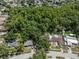 A beautiful neighborhood with lush greenery and houses with manicured lawns at 13923 Pathfinder Dr, Tampa, FL 33625