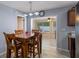 Cozy dining area with a wooden table and chairs, perfect for Gathering meals at 13923 Pathfinder Dr, Tampa, FL 33625