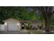 Well-maintained home with lush landscaping and mature trees at 13923 Pathfinder Dr, Tampa, FL 33625