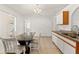 Bright eat-in kitchen with granite countertops and stainless appliances at 13935 Coronado Dr, Spring Hill, FL 34609