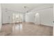 Bright living room with a bay window, tile floors and arches at 13935 Coronado Dr, Spring Hill, FL 34609