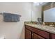 Well-maintained bathroom featuring granite countertops, vanity with storage, and neutral color palette at 14008 Lugano Ct, Hudson, FL 34669
