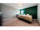 Guest bedroom featuring a large window for natural light and a view of the backyard at 14008 Lugano Ct, Hudson, FL 34669