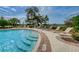 Pool deck with lounge chairs perfect for relaxation at 14008 Lugano Ct, Hudson, FL 34669