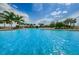 Refreshing swimming pool with sparkling blue water and serene surroundings at 14008 Lugano Ct, Hudson, FL 34669