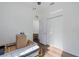 Bedroom featuring hardwood floors, closet, and ceiling fan at 15159 Durango Cir, Brooksville, FL 34604