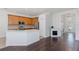 Open-concept kitchen with modern appliances and adjacent living area at 15159 Durango Cir, Brooksville, FL 34604