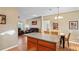Bright and airy living room featuring an open floor plan and comfortable seating at 15613 Charmwood Dr, Hudson, FL 34667