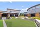 Commercial center featuring Be! LaBrava restaurant with outdoor seating and nearby shade umbrellas at 16697 Courtyard Loop, Land O Lakes, FL 34638