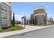 Shopping center featuring storefronts with lush landscaping and sidewalks at 16697 Courtyard Loop, Land O Lakes, FL 34638