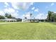 Expansive lawn surrounds this well-maintained home, offering plenty of outdoor space at 18102 Spencer Rd, Odessa, FL 33556