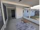 The screened patio offers shade and an outdoor living space at 2004 Culberson Ave, Dunedin, FL 34698