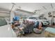 Spacious garage filled with an assortment of items, featuring ample storage and vehicle parking at 2585 Waterfall Dr, Spring Hill, FL 34608