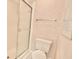 Bathroom featuring a glass shower with a white toilet at 2836 Featherstone # 2836, Holiday, FL 34691