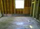 Interior view of a room with wood stud framing and a window, floor shows signs of wear at 2914 N 17Th St, Tampa, FL 33605
