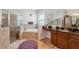 Bathroom with tub, shower and double sinks at 3243 Stonegate Falls Dr, Land O Lakes, FL 34638