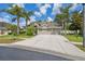 Attractive single-story home with a three-car garage and manicured landscaping at 3243 Stonegate Falls Dr, Land O Lakes, FL 34638