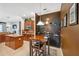 Kitchen with eat-in area, bar with sink, and wine rack at 3243 Stonegate Falls Dr, Land O Lakes, FL 34638
