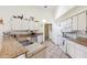 Bright kitchen with granite countertops, stainless steel appliances, and ample cabinet space at 3468 El Prado Ave, Spring Hill, FL 34609