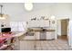 Bright kitchen with granite countertops, stainless steel appliances, and ample cabinet space at 3468 El Prado Ave, Spring Hill, FL 34609