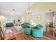 Bright living room featuring vaulted ceiling, hardwood floors, and neutral walls at 3468 El Prado Ave, Spring Hill, FL 34609