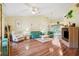 Bright living room featuring vaulted ceiling, hardwood floors, and neutral walls at 3468 El Prado Ave, Spring Hill, FL 34609