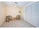 Bonus room featuring tile floors, ceiling fan, and closet at 3838 Lanyard Ct # B, New Port Richey, FL 34652
