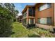 Charming condo with screened lanai and lush landscaping for a relaxing outdoor experience at 3838 Lanyard Ct # B, New Port Richey, FL 34652