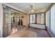 Enclosed Florida room with a view of the backyard at 3838 Lanyard Ct # B, New Port Richey, FL 34652