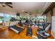 Well-equipped gym with treadmills, elliptical machines, and free weights, creating a convenient fitness space at 3838 Lanyard Ct # B, New Port Richey, FL 34652