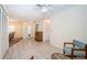 Open living room with tiled floors offering plenty of space at 3838 Lanyard Ct # B, New Port Richey, FL 34652