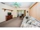 Inviting living room features a comfortable floral sofa, recliner, and ceiling fan for relaxed living at 3838 Lanyard Ct # B, New Port Richey, FL 34652
