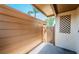 An enclosed patio area with a wooden fence, offering privacy at 3838 Lanyard Ct # B, New Port Richey, FL 34652
